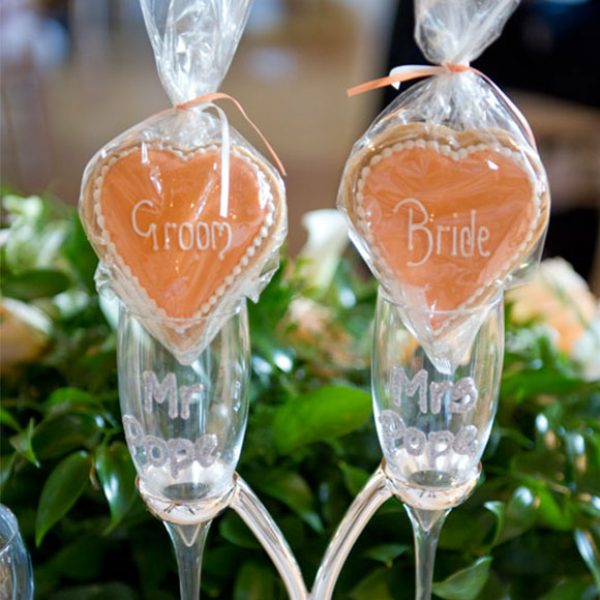 Bride and groom biscuits as wedding favours