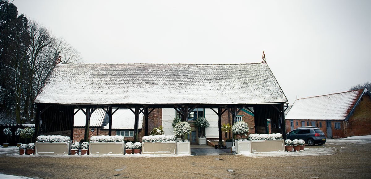 Gather Barn at Gaynes Park covered in snow – barn hire Essex