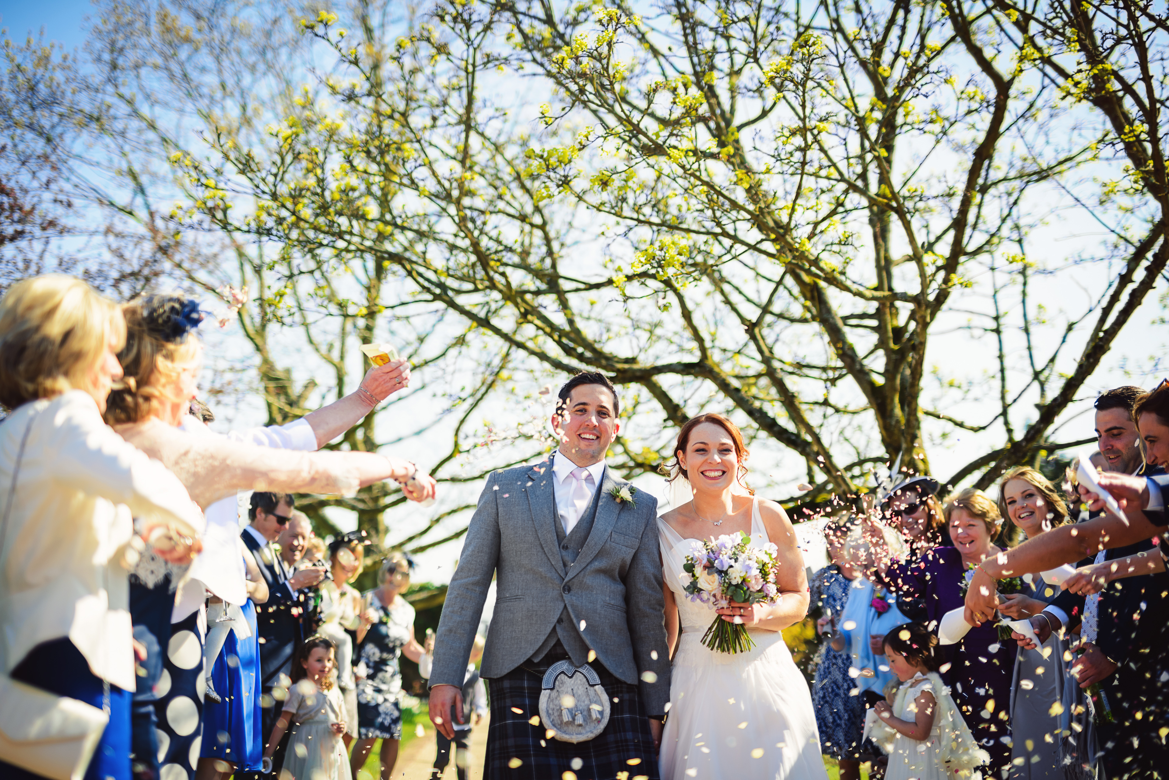 brideandgroomconfettispringwedding Gaynes Park
