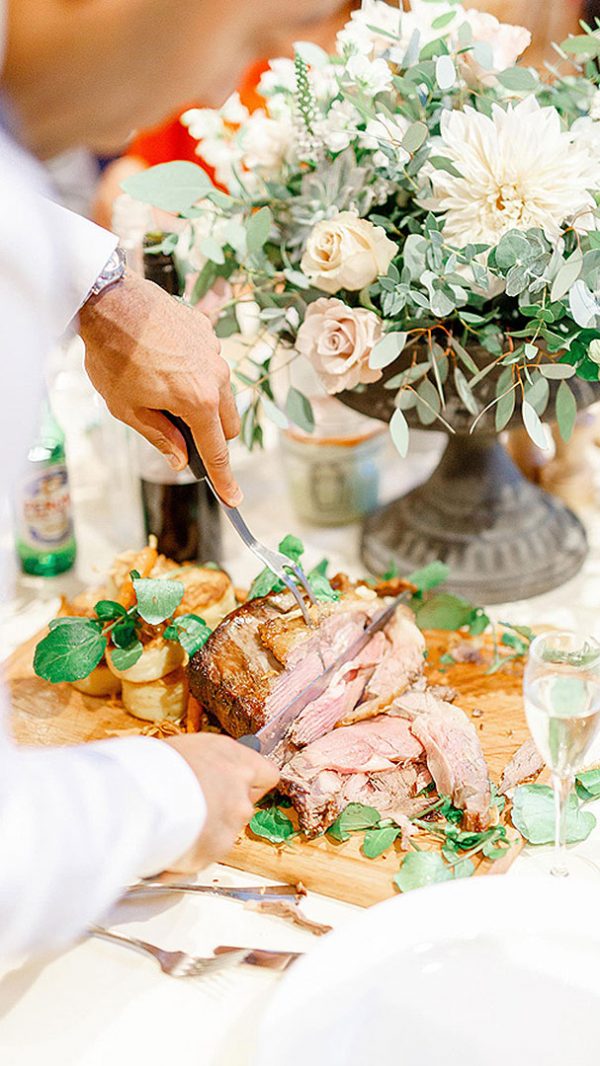A traditional roast dinner is served to wedding guests perfect for a rustic wedding
