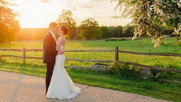 A couple embrace on the wedding entrance of this unique wedding venue - wedding pictures