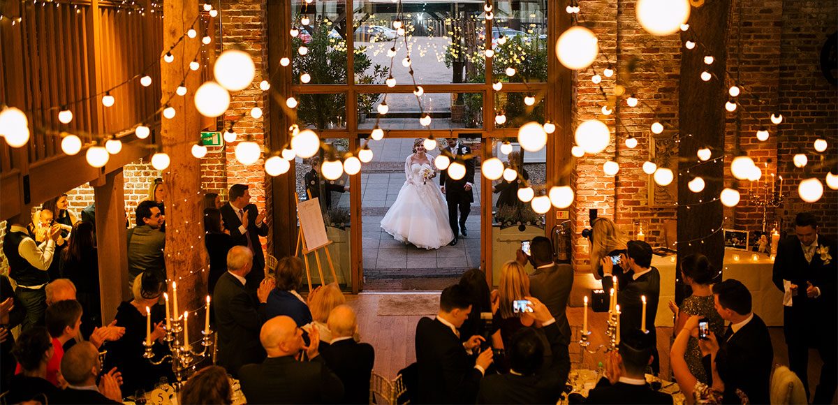 Mill Barn decorated with lights for a winter wedding reception – barn wedding venues in Essex