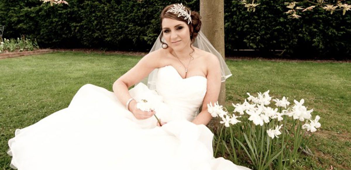 Bride enjoying the Spring gardens at Gaynes Park -wedding venues in Essex