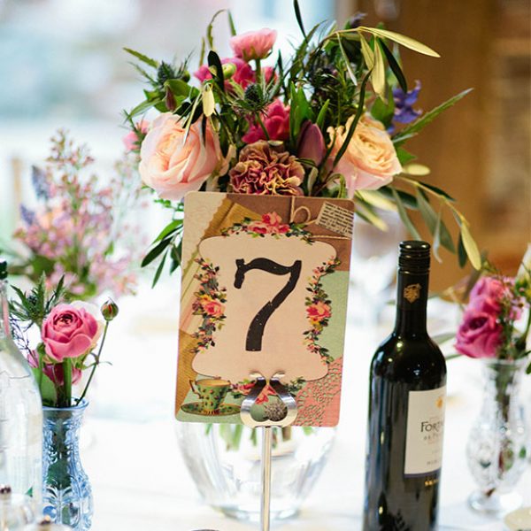 Flowers and table number for a barn wedding reception