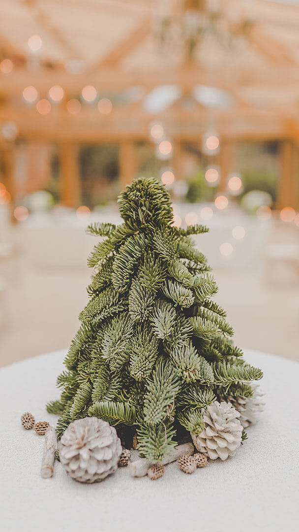 A Christmas tree inspires the wedding table centrepieces at this winter wedding - christmas wedding ideas