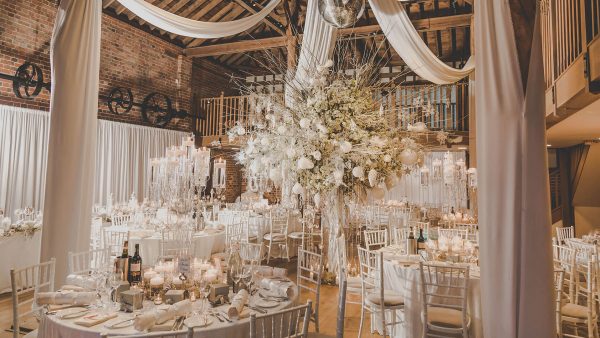 Gaynes Park barn wedding venue is decorated beautifully for a winter wedding with white wedding theme
