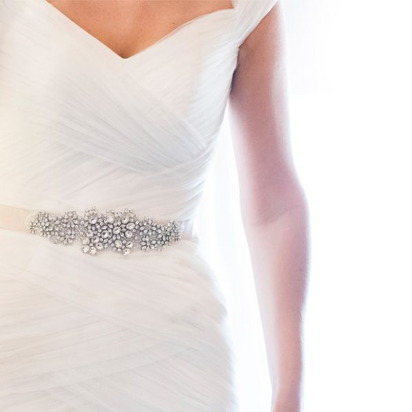 Embellished belt on bride’s wedding dress