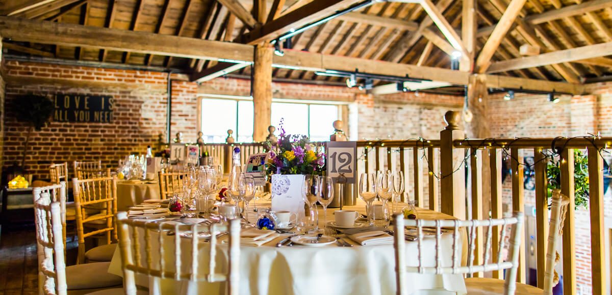 Couples can use the mezzanine in the Mill Barn at Gaynes Park for extra space on their wedding day