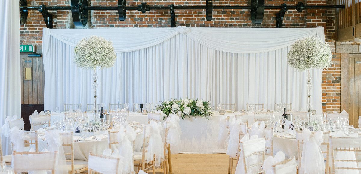 Add a luxurious backdrop to your top table in the Mill Barn at Gaynes Park