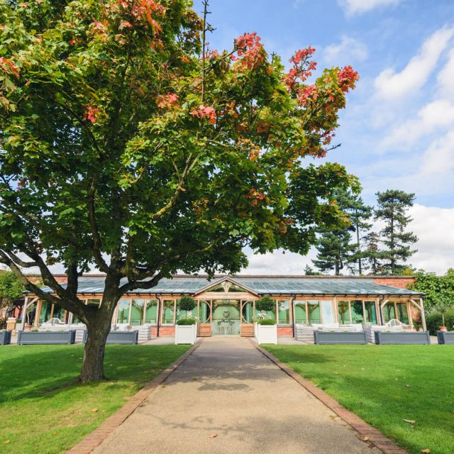 The Orangery at Gaynes Park wedding venue in Essex sits within stunning walled gardens