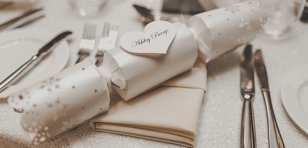 For their wedding at Gaynes Park a couple used Christmas crackers as their wedding favours