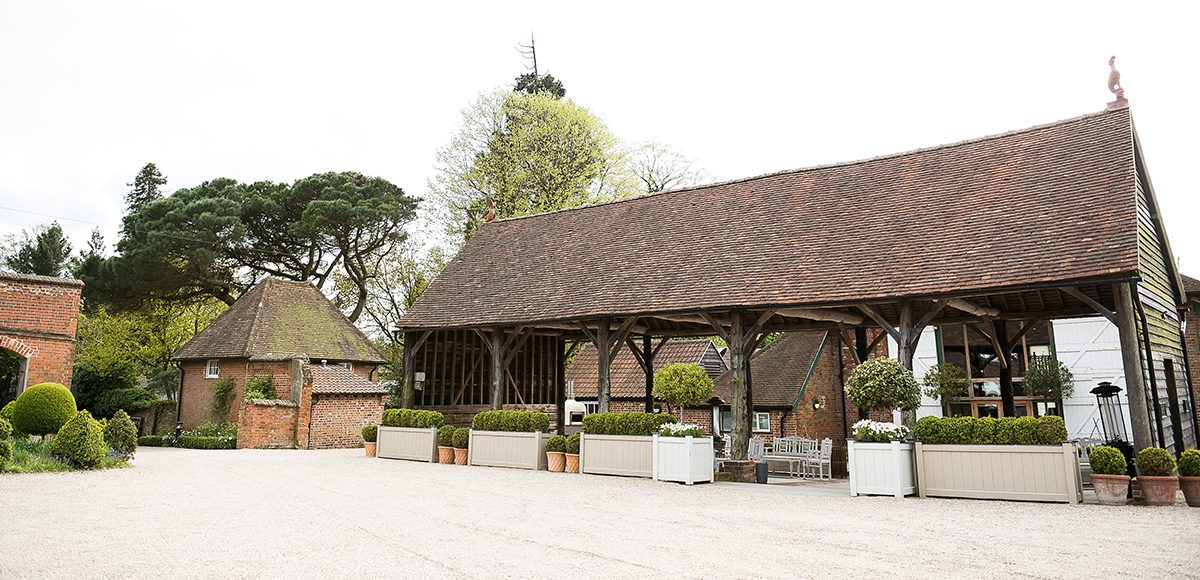 The Gather Barn at Gaynes Park is the perfect backdrop for a rustic wedding
