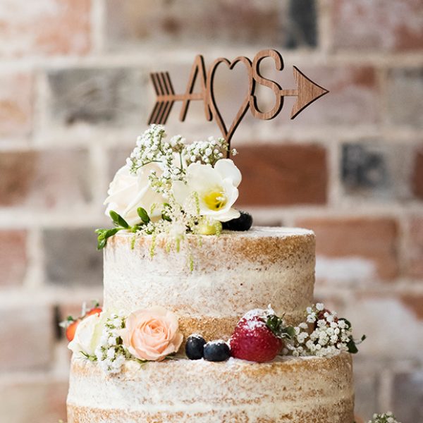 A naked wedding cake is the perfect choice for a rustic wedding at Gaynes Park