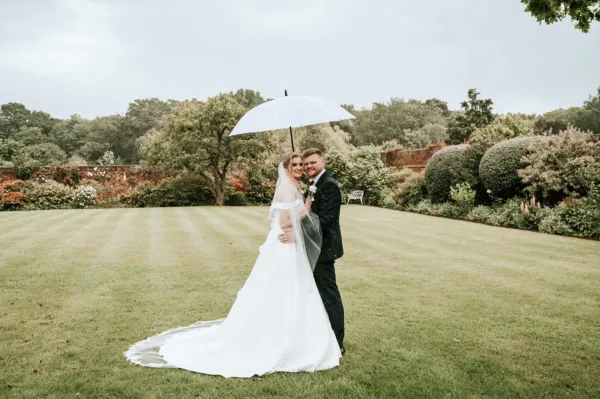 Couple in the Walled Garden at Gaynes Park wedding venue
